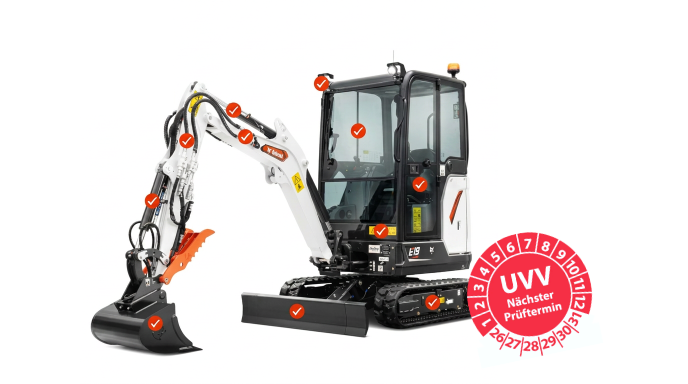 Ein Bobcat-Bagger mit Prüfzeichen und UVV-Plakette